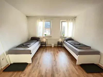 Ein Bett oder Betten in einem Zimmer der Unterkunft Worker Apartment Gelsenkirchen