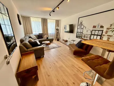 Ein Sitzbereich in der Unterkunft Schwebebahn View Apartment