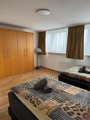 Ein Bett oder Betten in einem Zimmer der Unterkunft Penthouse Central Apartment