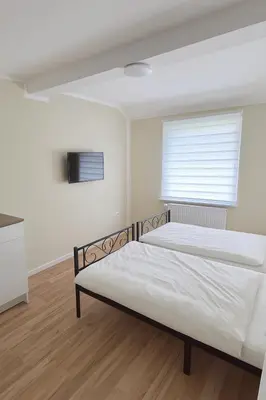 Ein Bett oder Betten in einem Zimmer der Unterkunft My Loft