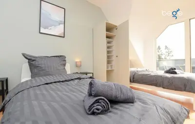 Ein Bett oder Betten in einem Zimmer der Unterkunft BEGE APARTMENTS WorkNest Comfort