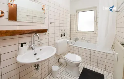 Ein Badezimmer in der Unterkunft BEGE APARTMENTS WorkNest Comfort