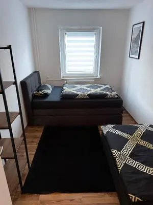 Ein Bett oder Betten in einem Zimmer der Unterkunft Apartment HAMMer