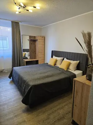 Ein Bett oder Betten in einem Zimmer der Unterkunft N Hotel
