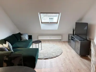 TV/Unterhaltungsangebot in der Unterkunft Fancy Apartment with 4K TV for 3 people and 2 people sleep couch - includes kitchen