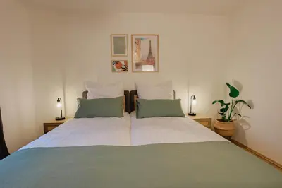 Ein Bett oder Betten in einem Zimmer der Unterkunft Atlas Apartment Essen, 3 Zimmer, Uniklinik, Messe, Parkplatz, Balkon
