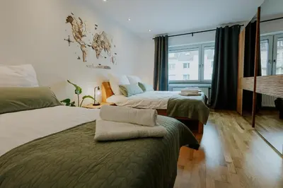 Ein Bett oder Betten in einem Zimmer der Unterkunft Atlas Apartment Essen, 3 Zimmer, Uniklinik, Messe, Parkplatz, Balkon