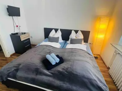 Ein Bett oder Betten in einem Zimmer der Unterkunft Nordsee Apartment