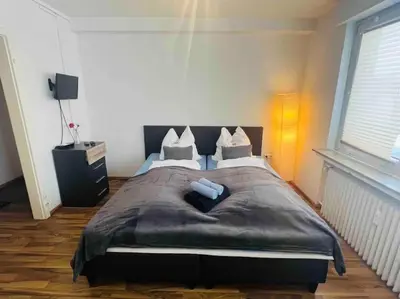 Ein Bett oder Betten in einem Zimmer der Unterkunft Nordsee Apartment
