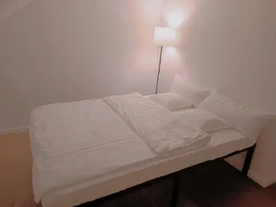 Ein Bett oder Betten in einem Zimmer der Unterkunft Neues 3ZimerHaus Düsseldorf Airport &Messe