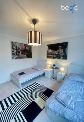 Ein Bett oder Betten in einem Zimmer der Unterkunft BEGE APARTMENTS WorkEase
