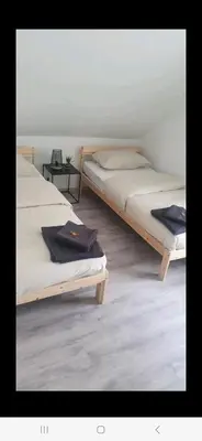 Ein Bett oder Betten in einem Zimmer der Unterkunft Gemütliches Haus am Zollverein