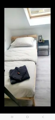 Ein Bett oder Betten in einem Zimmer der Unterkunft Gemütliches Haus am Zollverein