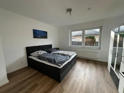 Ein Bett oder Betten in einem Zimmer der Unterkunft Ferienwohnung Janne