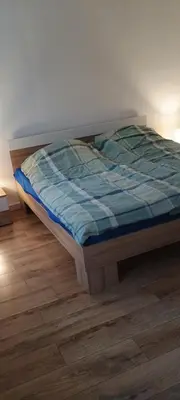 Ein Bett oder Betten in einem Zimmer der Unterkunft grünes Glück