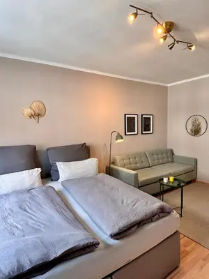 Ein Bett oder Betten in einem Zimmer der Unterkunft Eleganz und Komfort mitten in Essen!
