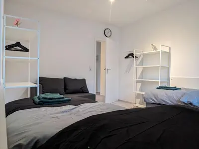 Ein Bett oder Betten in einem Zimmer der Unterkunft Monteurwohnung Ferienwohnung Business Appartement Mettmann 1 OG