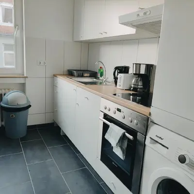 Küche/Küchenzeile in der Unterkunft Monteurwohnung Ferienwohnung Business Appartement Mettmann 1 OG
