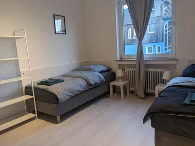 Ein Bett oder Betten in einem Zimmer der Unterkunft Monteurwohnung Ferienwohnung Business Appartement Mettmann 1 OG