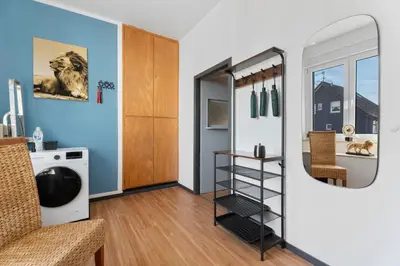 Ein Bett oder Betten in einem Zimmer der Unterkunft CASATUA - Parkplatz - Tischfussball - Dart - Messe - WiFi - Küche