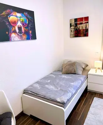 Ein Bett oder Betten in einem Zimmer der Unterkunft MOLA Apartments-Stilvolle Altstadtwohnung- Seilersee-5 Personen-Terrasse-Grill-Gratis WLAN