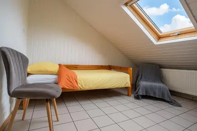 Ein Bett oder Betten in einem Zimmer der Unterkunft Ferienwohnung , ruhig gute Messe Anbindung,Parkplätze & Top- öffentliche Verkehrsmittel zur City und Messe