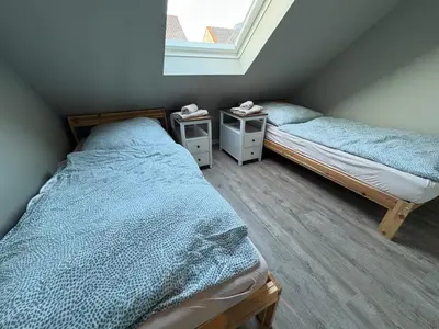 Ein Bett oder Betten in einem Zimmer der Unterkunft Andrews Motobike Apartment