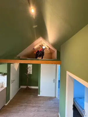 Ein Bett oder Betten in einem Zimmer der Unterkunft Andrews Motobike Apartment