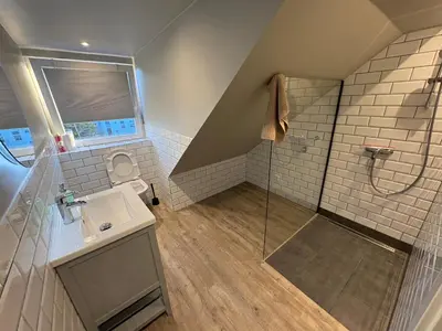 Ein Badezimmer in der Unterkunft Andrews Motobike Apartment