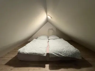 Ein Bett oder Betten in einem Zimmer der Unterkunft Andrews Motobike Apartment