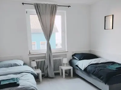Ein Bett oder Betten in einem Zimmer der Unterkunft Gleaming Apartment in Mettmann