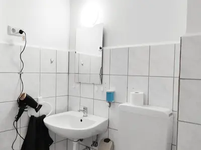 Ein Badezimmer in der Unterkunft Gleaming Apartment in Mettmann