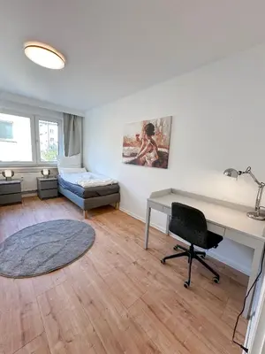Ein Bett oder Betten in einem Zimmer der Unterkunft Modern flat - for up to 7 people