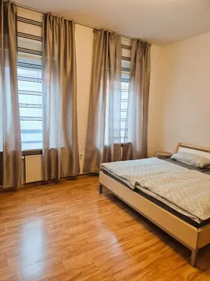Ein Bett oder Betten in einem Zimmer der Unterkunft Apartment Karolina