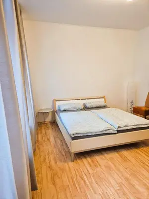 Ein Bett oder Betten in einem Zimmer der Unterkunft Apartment Karolina