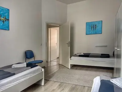 Ein Bett oder Betten in einem Zimmer der Unterkunft Ring-Apartments Gelsenkirchen, Zentrum