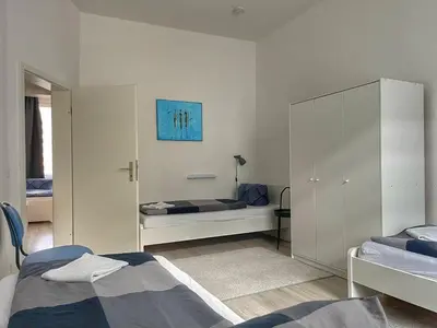 Ein Bett oder Betten in einem Zimmer der Unterkunft Ring-Apartments Gelsenkirchen, Zentrum