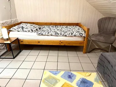 Ein Bett oder Betten in einem Zimmer der Unterkunft Ruhiges Apartment, Parkplätze & gute Anbindung City, Messe, Autobahn