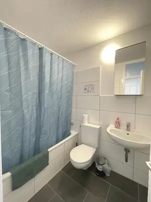 Ein Badezimmer in der Unterkunft Gemütliches Apartment Hagen