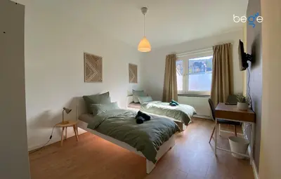 Ein Bett oder Betten in einem Zimmer der Unterkunft BEGE APARTMENTS Business Escape