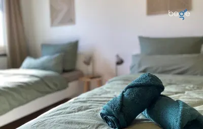 Ein Bett oder Betten in einem Zimmer der Unterkunft BEGE APARTMENTS Business Escape