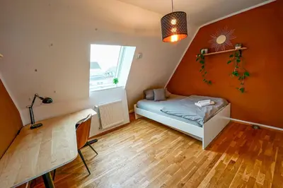 Ein Bett oder Betten in einem Zimmer der Unterkunft Exklusive Business-Maisonette - Luxus und Top-Lage