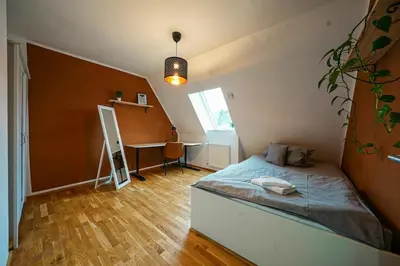 Ein Bett oder Betten in einem Zimmer der Unterkunft Exklusive Business-Maisonette - Luxus und Top-Lage