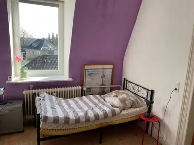 Ein Bett oder Betten in einem Zimmer der Unterkunft Ferienwohnung Radevormwald -Mitte-2