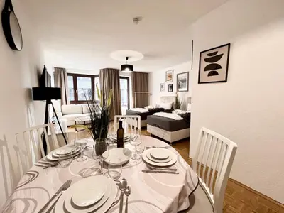 Ein Sitzbereich in der Unterkunft PrimeTimeSuites Nähe Messe & HBF