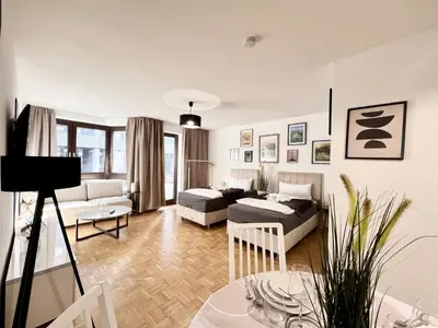 Ein Sitzbereich in der Unterkunft PrimeTimeSuites Nähe Messe & HBF