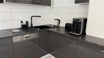 Küche/Küchenzeile in der Unterkunft Zentral & Modern Nähe Düsseldorf und Köln