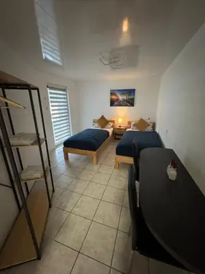 Ein Bett oder Betten in einem Zimmer der Unterkunft DERKO Apart