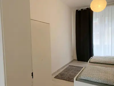 Ein Bett oder Betten in einem Zimmer der Unterkunft Schöne Altbauwohnung in Wuppertal