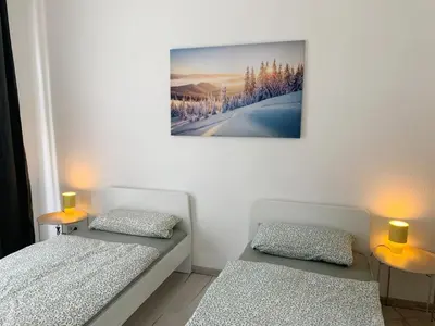 Ein Bett oder Betten in einem Zimmer der Unterkunft Schöne Altbauwohnung in Wuppertal